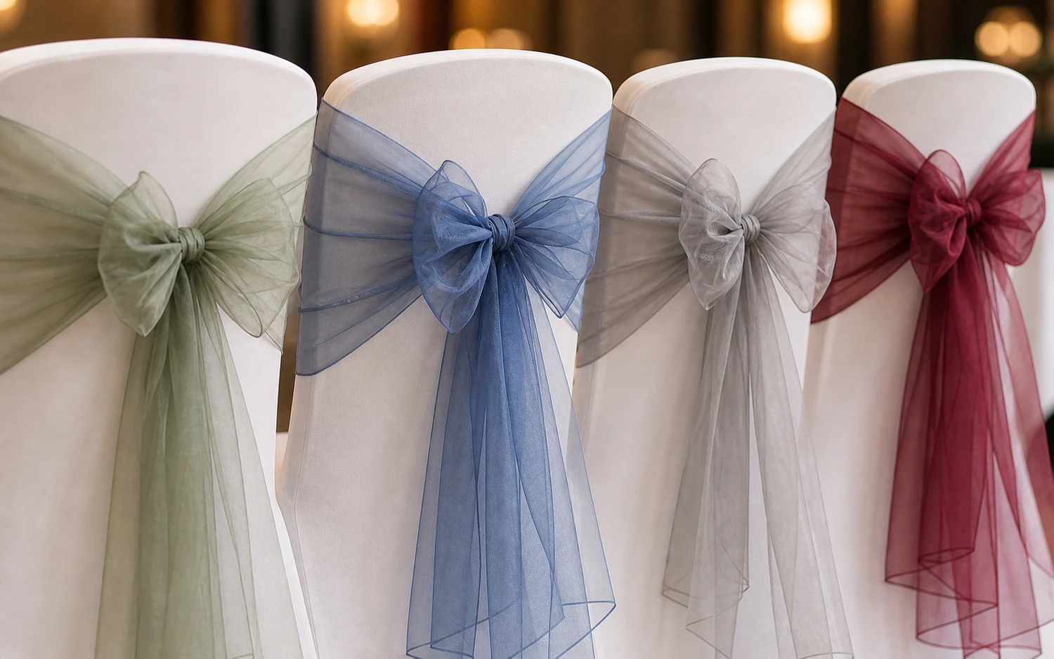 Close-up of tied banquet chair sashes on covered chairs